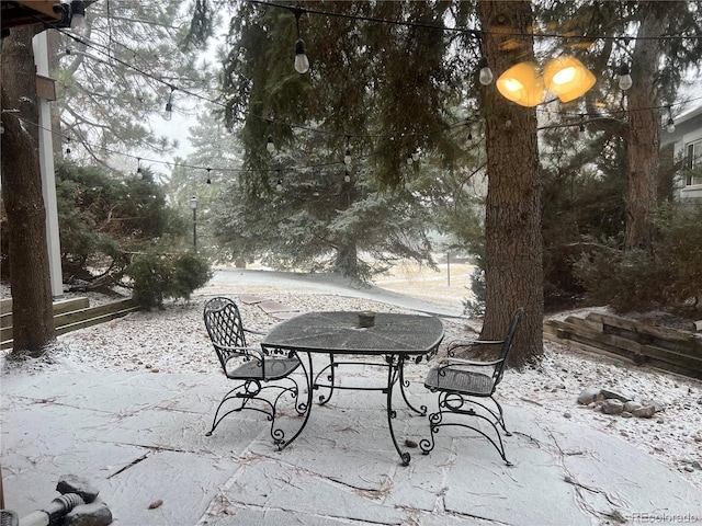 view of snow covered patio