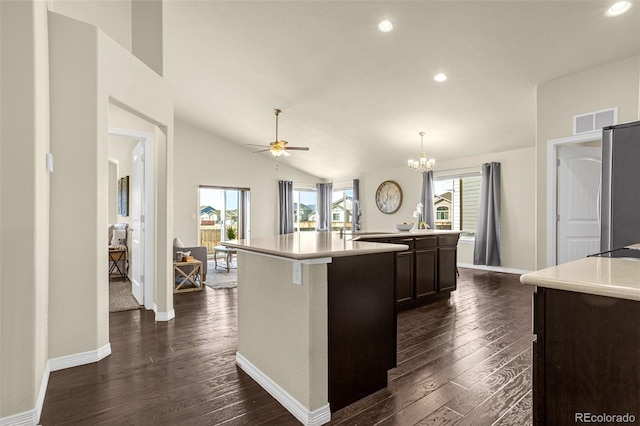 kitchen featuring dark wood finished floors, visible vents, and light countertops