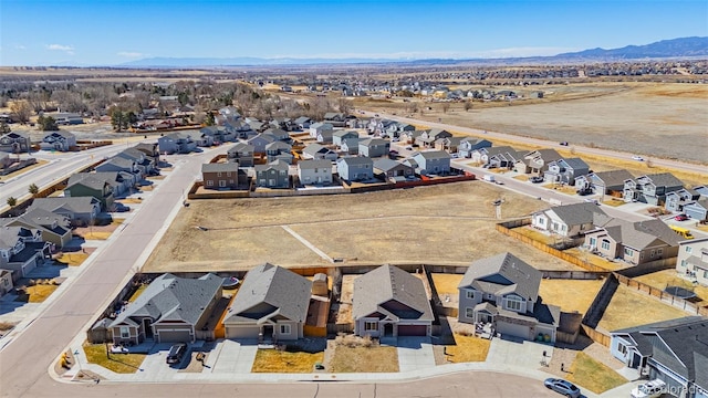 bird's eye view with a mountain view and a residential view