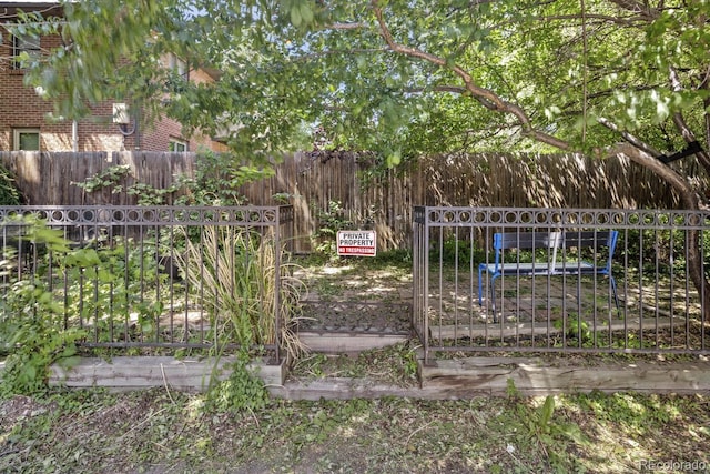 1450 Albion St Unit 206, Denver, CO 80220 - view of yard featuring a gate