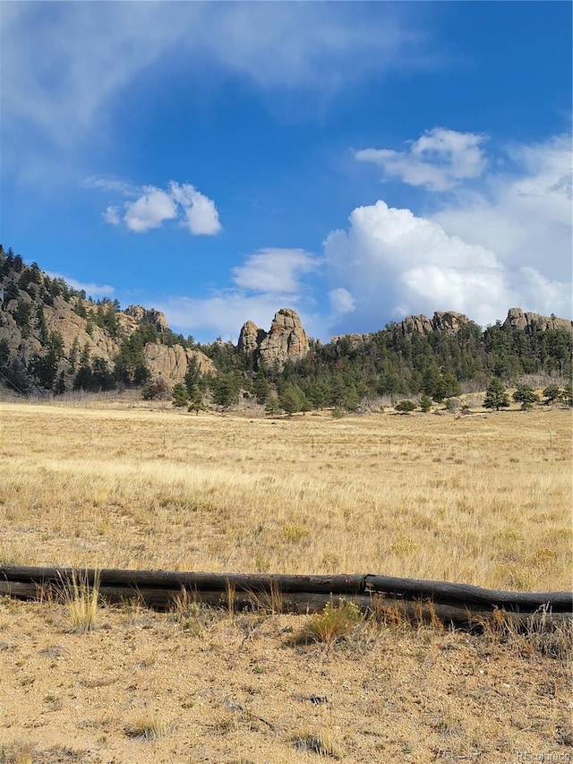 view of landscape with a rural view