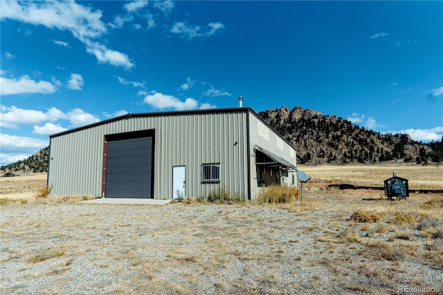 view of outbuilding with a garage