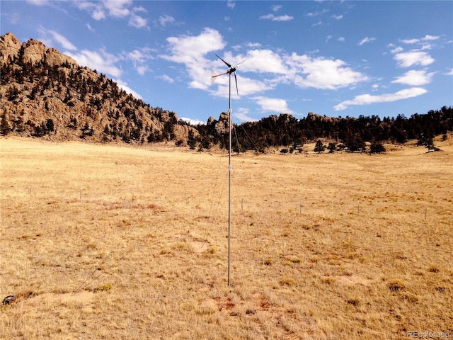 view of mountain feature with a rural view