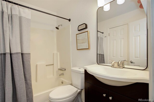 full bathroom with vanity, toilet, and shower / bathtub combination with curtain