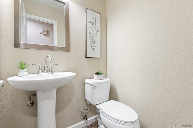 4452 W Pondview Dr, Littleton, CO 80123 - bathroom with toilet and baseboards