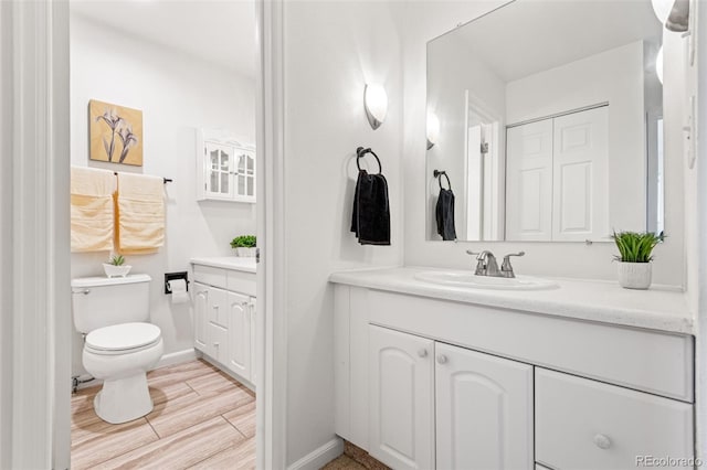4452 W Pondview Dr, Littleton, CO 80123 - bathroom featuring vanity and wood finished floors