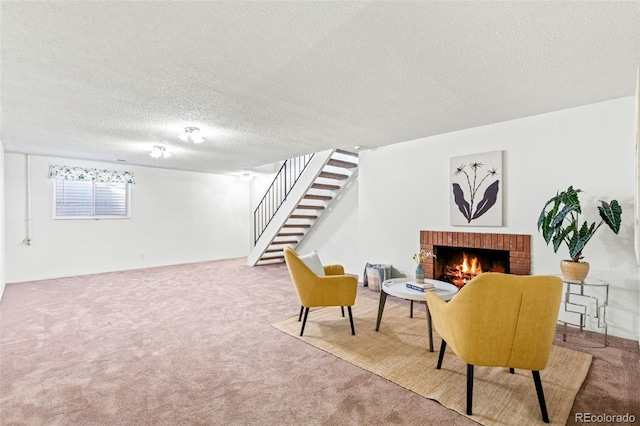 4452 W Pondview Dr, Littleton, CO 80123 - living area featuring carpet flooring, stairs, a fireplace, and a textured ceiling