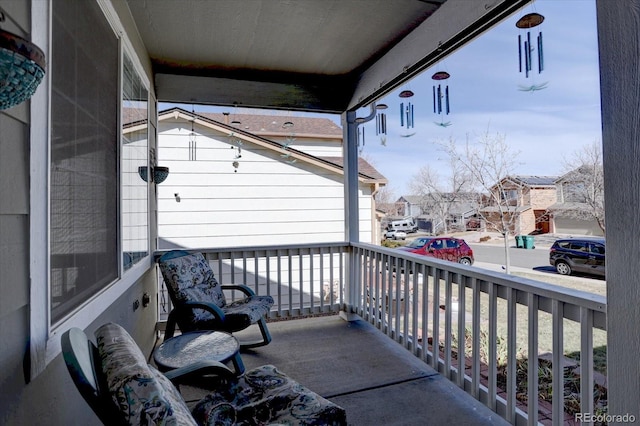 balcony featuring a residential view