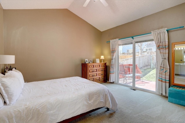 carpeted bedroom with visible vents, a ceiling fan, lofted ceiling, and access to outside