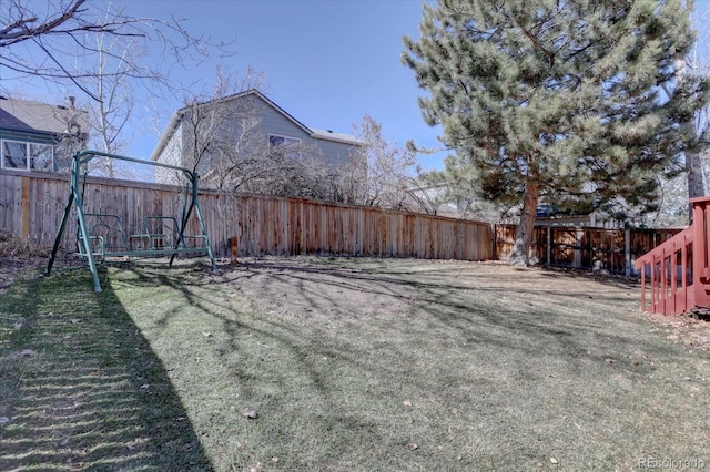 view of yard featuring a fenced backyard