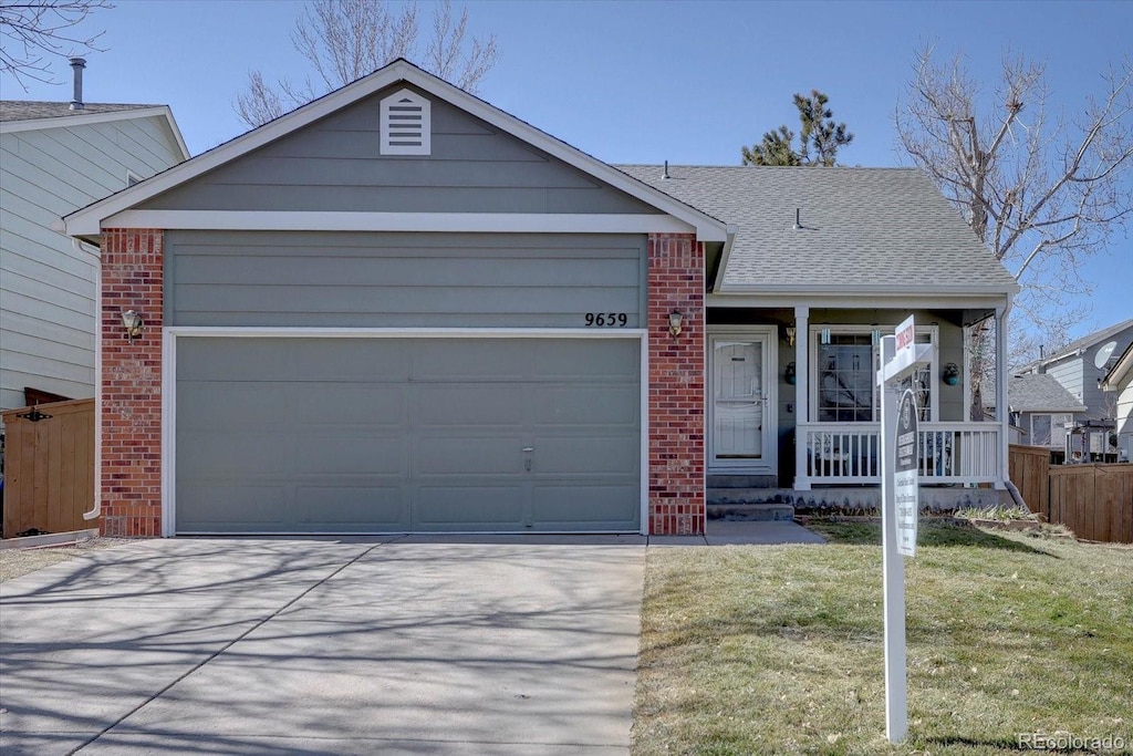 9659 Autumnwood Pl, Highlands Ranch, CO 80129 - ranch-style house featuring a garage, fence, concrete driveway, and brick siding