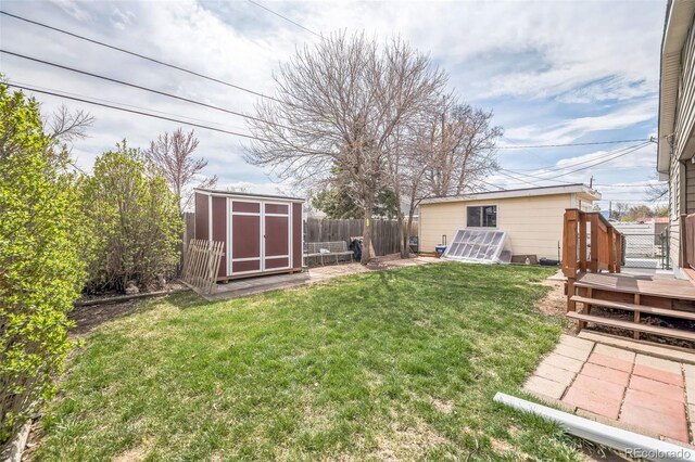 3656 W 77th Ave, Westminster, CO 80030 - fenced backyard with a deck and a storage shed