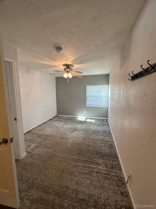 3656 W 77th Ave, Westminster, CO 80030 - unfurnished room featuring carpet flooring, ceiling fan, a textured ceiling, and a textured wall