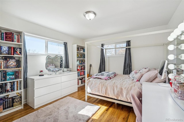 bedroom with light wood-style flooring