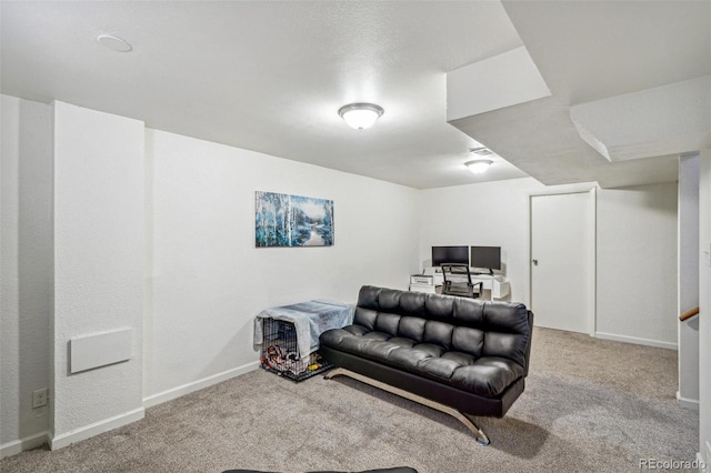 living area with carpet floors and baseboards