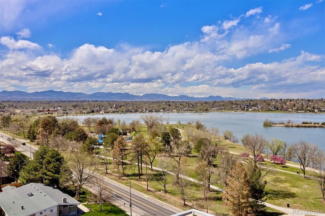 aerial view featuring a water and mountain view