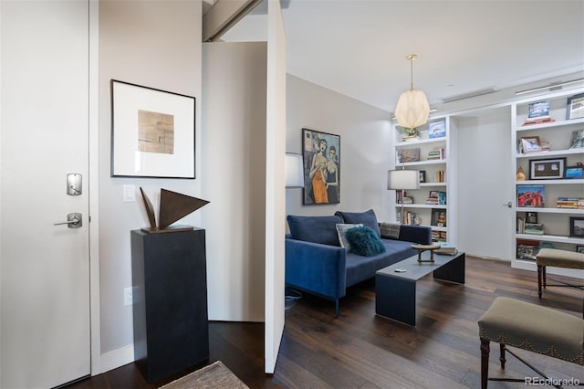 living room with dark hardwood / wood-style floors