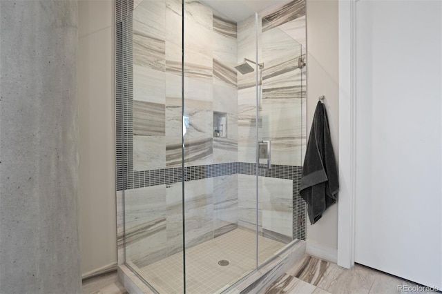 bathroom featuring an enclosed shower