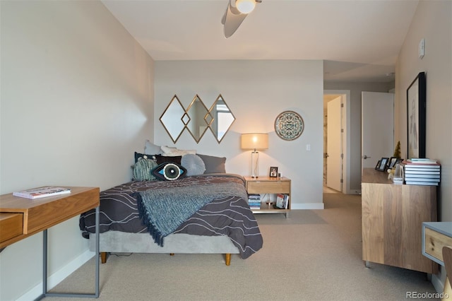 bedroom with ceiling fan and light colored carpet