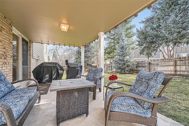 view of patio / terrace featuring an outdoor hangout area, area for grilling, and fence