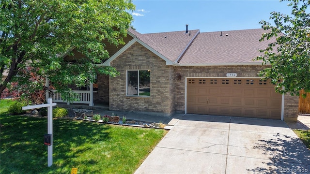 1936 E 144th Dr, Thornton, CO 80602 - ranch-style house featuring driveway, roof with shingles, a front lawn, a garage, and brick siding