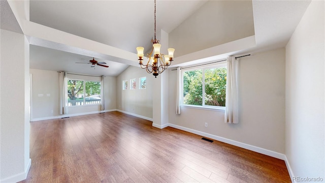 1936 E 144th Dr, Thornton, CO 80602 - unfurnished room featuring lofted ceiling, wood finished floors, a chandelier, and a ceiling fan