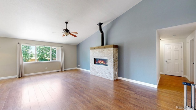1936 E 144th Dr, Thornton, CO 80602 - unfurnished living room with a ceiling fan, wood finished floors, and high vaulted ceiling