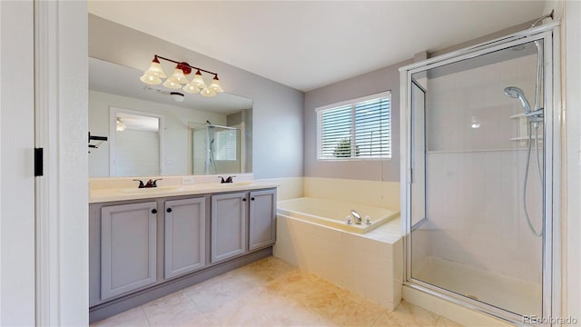 1936 E 144th Dr, Thornton, CO 80602 - bathroom with a bath, a stall shower, double vanity, and tile patterned flooring