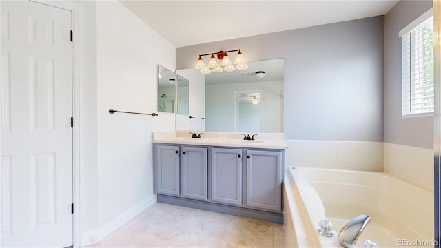 1936 E 144th Dr, Thornton, CO 80602 - bathroom with a bath, double vanity, and tile patterned floors