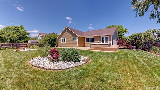 1936 E 144th Dr, Thornton, CO 80602 - rear view of property featuring a fenced backyard and a patio area