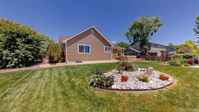 1936 E 144th Dr, Thornton, CO 80602 - rear view of property featuring a patio area