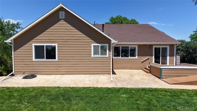 1936 E 144th Dr, Thornton, CO 80602 - rear view of house with a patio area