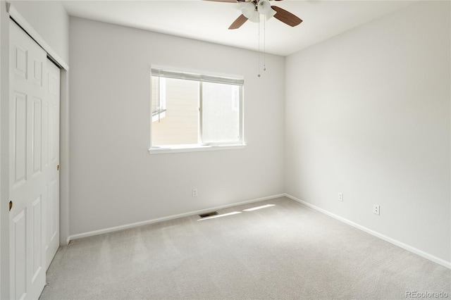 10511 Jaguar Gln, Lone Tree, CO 80124 - unfurnished bedroom with carpet flooring, baseboards, a closet, and ceiling fan