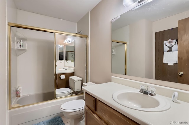 full bathroom with toilet, combined bath / shower with glass door, and vanity