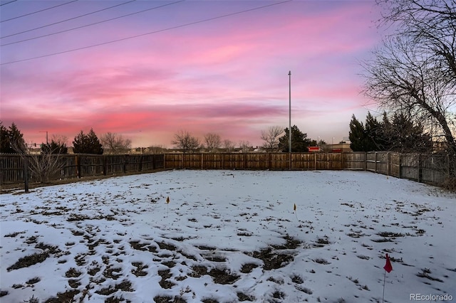 view of yard covered in snow