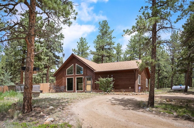 21 Crystal Rock Rd, Bailey, CO 80421 - rustic home featuring driveway and a shingled roof