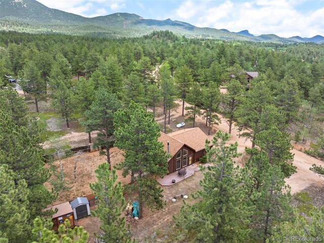 21 Crystal Rock Rd, Bailey, CO 80421 - aerial view of property's location featuring a heavily wooded area and mountains