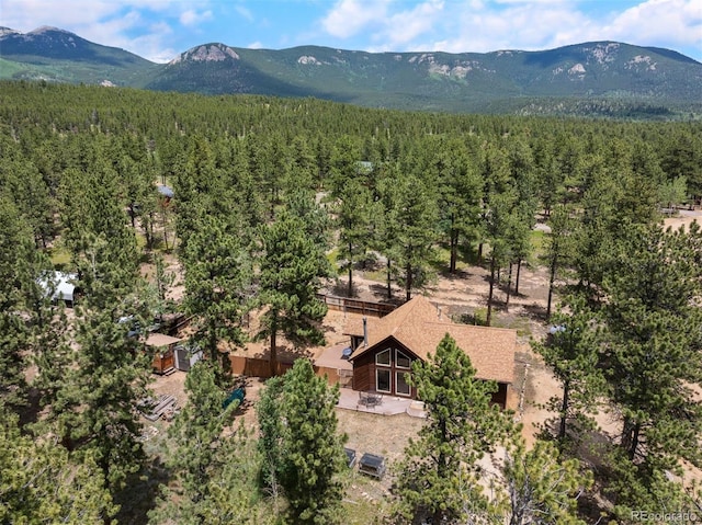 21 Crystal Rock Rd, Bailey, CO 80421 - view of subject property featuring a mountainous background and a forest