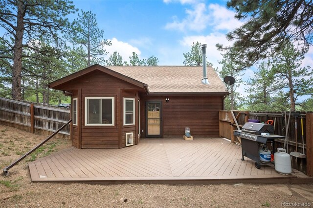 21 Crystal Rock Rd, Bailey, CO 80421 - rear view of house with a shingled roof and a deck