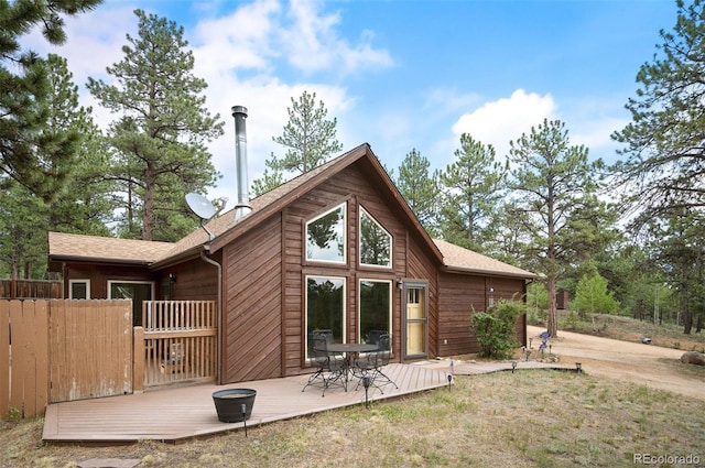 21 Crystal Rock Rd, Bailey, CO 80421 - back of property with a wooden deck