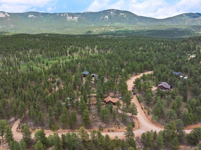 21 Crystal Rock Rd, Bailey, CO 80421 - aerial view of property's location with a heavily wooded area and a mountain backdrop