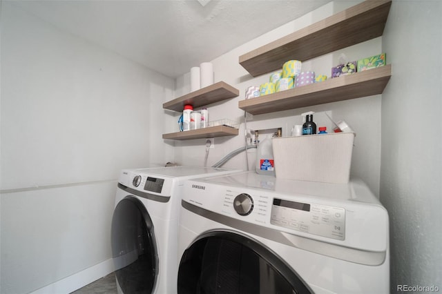 17372 E Prentice Cir, Centennial, CO 80015 - laundry room featuring washing machine and dryer and baseboards