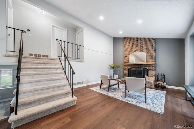 17372 E Prentice Cir, Centennial, CO 80015 - living area featuring stairs, wood finished floors, baseboards, and recessed lighting