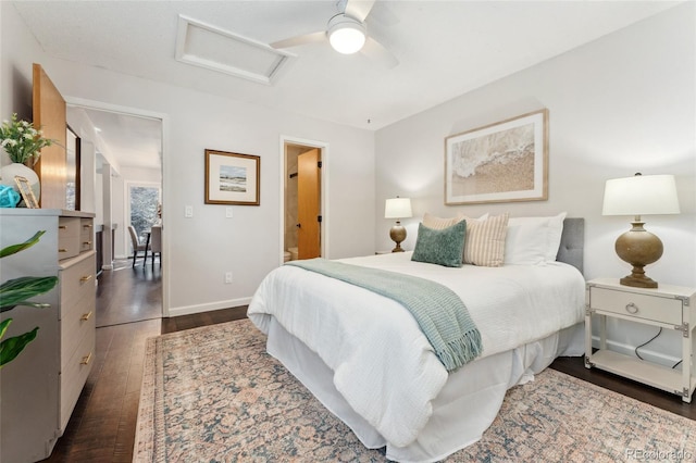 517 Chiswick Cir, Highlands Ranch, CO 80126 - bedroom featuring attic access, dark wood-style floors, and a ceiling fan