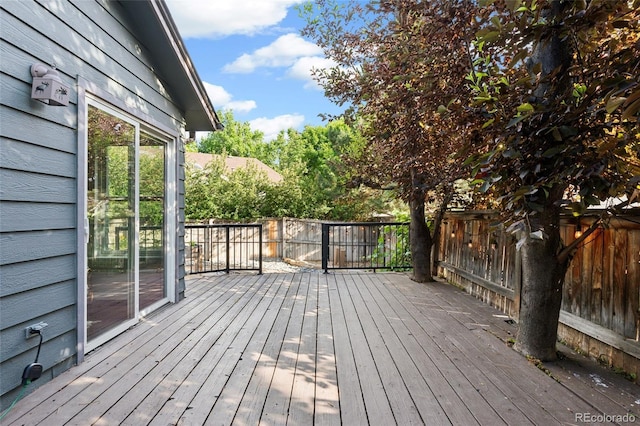 517 Chiswick Cir, Highlands Ranch, CO 80126 - wooden terrace featuring a fenced backyard