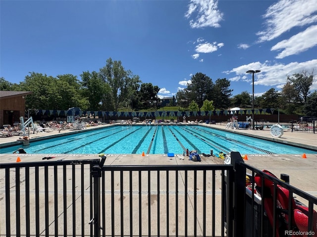 517 Chiswick Cir, Highlands Ranch, CO 80126 - community pool with a patio