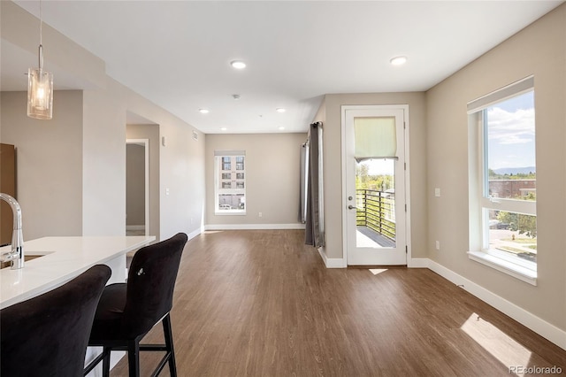 2374 S University Blvd Unit 202, Denver, CO 80210 - dining room with dark wood finished floors, baseboards, and recessed lighting