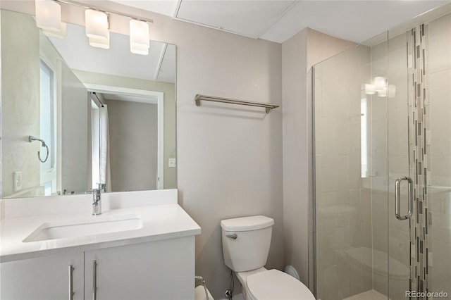 2374 S University Blvd Unit 202, Denver, CO 80210 - bathroom with toilet, vanity, and a shower stall