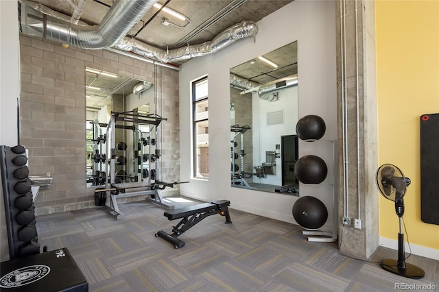 2374 S University Blvd Unit 202, Denver, CO 80210 - workout area with carpet floors and baseboards