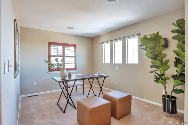 view of carpeted office space